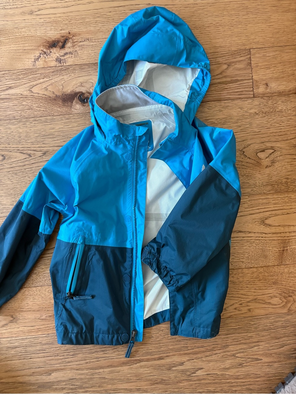 REI Kids Two-Tone Teal and Navy Hooded Rain Jacket